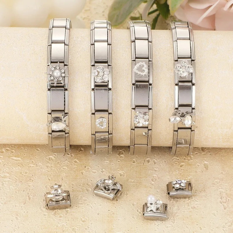 Shiny CZ Charm Bracelet – Heart, Cat, Bow & Wing Links Charm Bracelet Qme