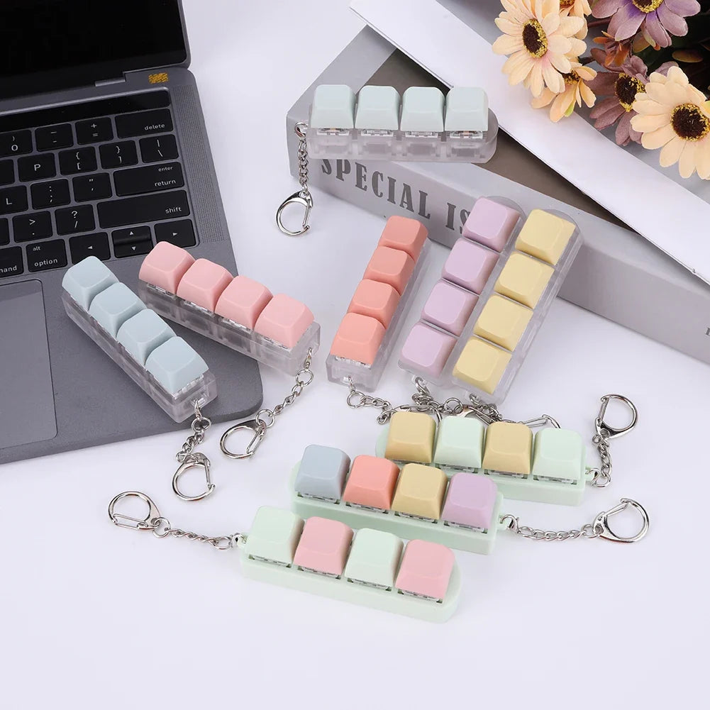 4-Key Keycap Fidget Clicker Cube Keychain Toy – 9 Colors Fidget Clicker Toy Qme