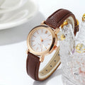Minimalist Women's Quartz Watch – White Dial & Brown Leather Strap Women's Quartz Watch Qme Brown White