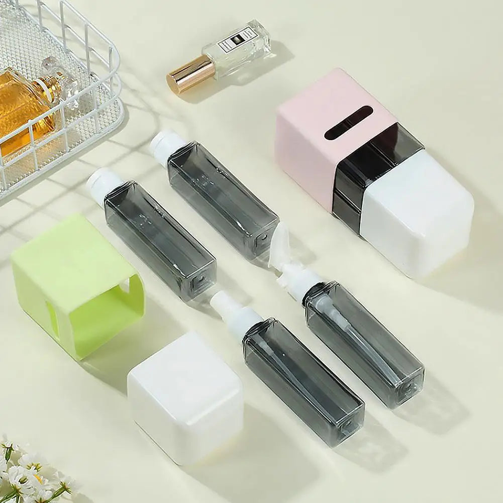 4-in-1 Refillable Travel Dispenser Bottles – Shampoo & Lotion Travel Dispenser Set Qme