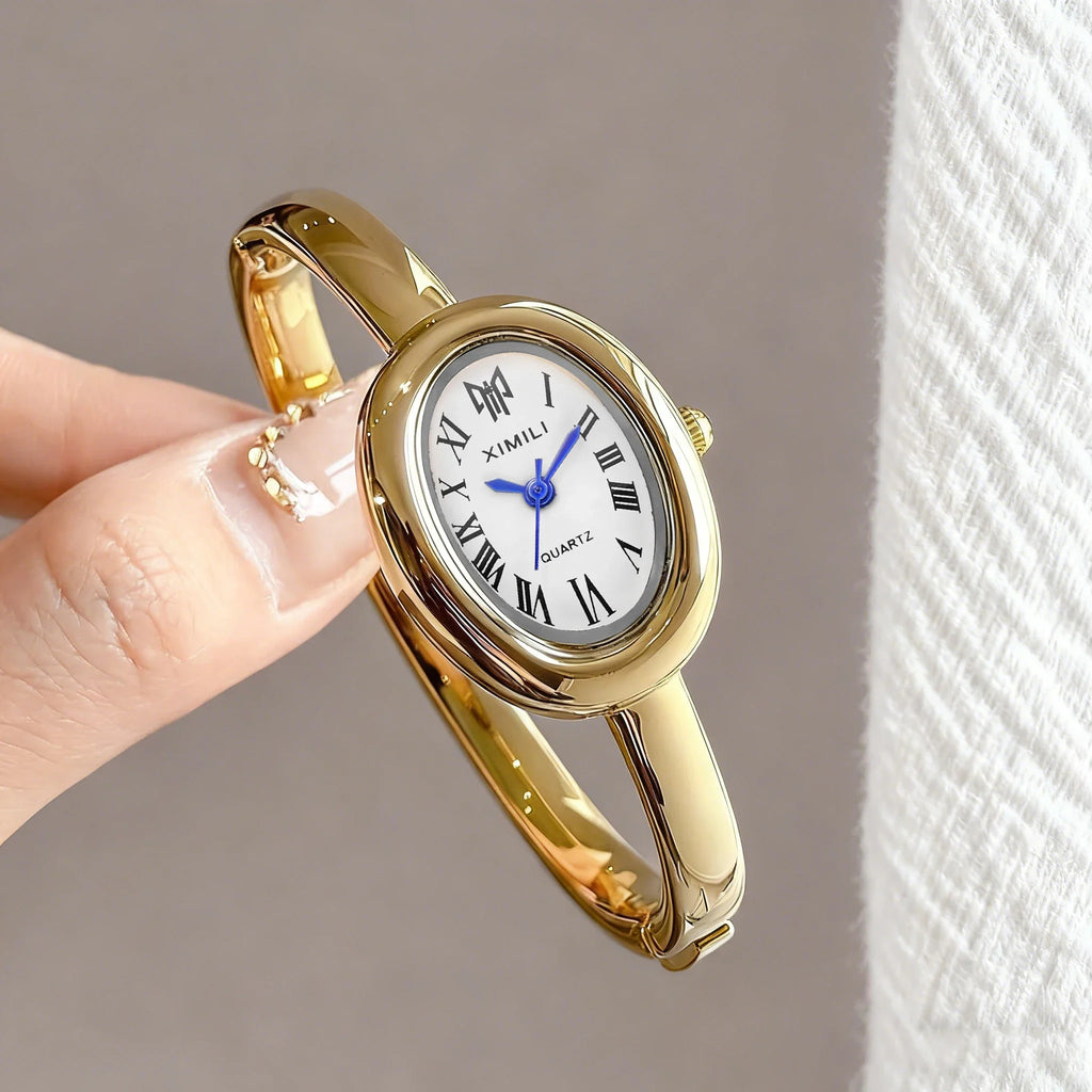 Minimalist Gold Bangle Ladies Watch | Oval Dial Roman Numerals Bangle Ladies Watch Qme