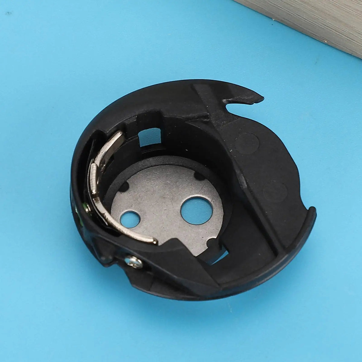 Janome Bobbin Case #3152221 – Rotating Hook Shuttle Shell Bobbin Case Qme