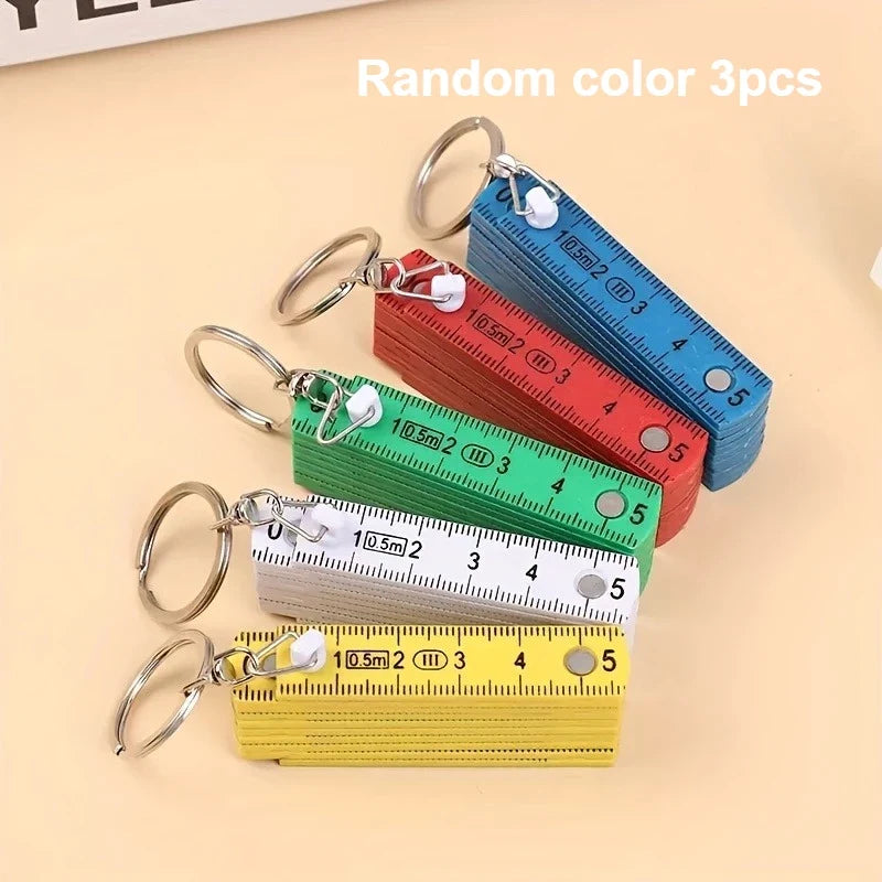 Mini Folding Ruler Keychain – Portable Plastic Measuring Tool Folding Keychain Ruler Qme Random color 3pcs
