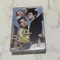 Retro Indie Pop Cassette Tape – Comic-Style Duo Collage Cover Novelty Collectible Qme Norman