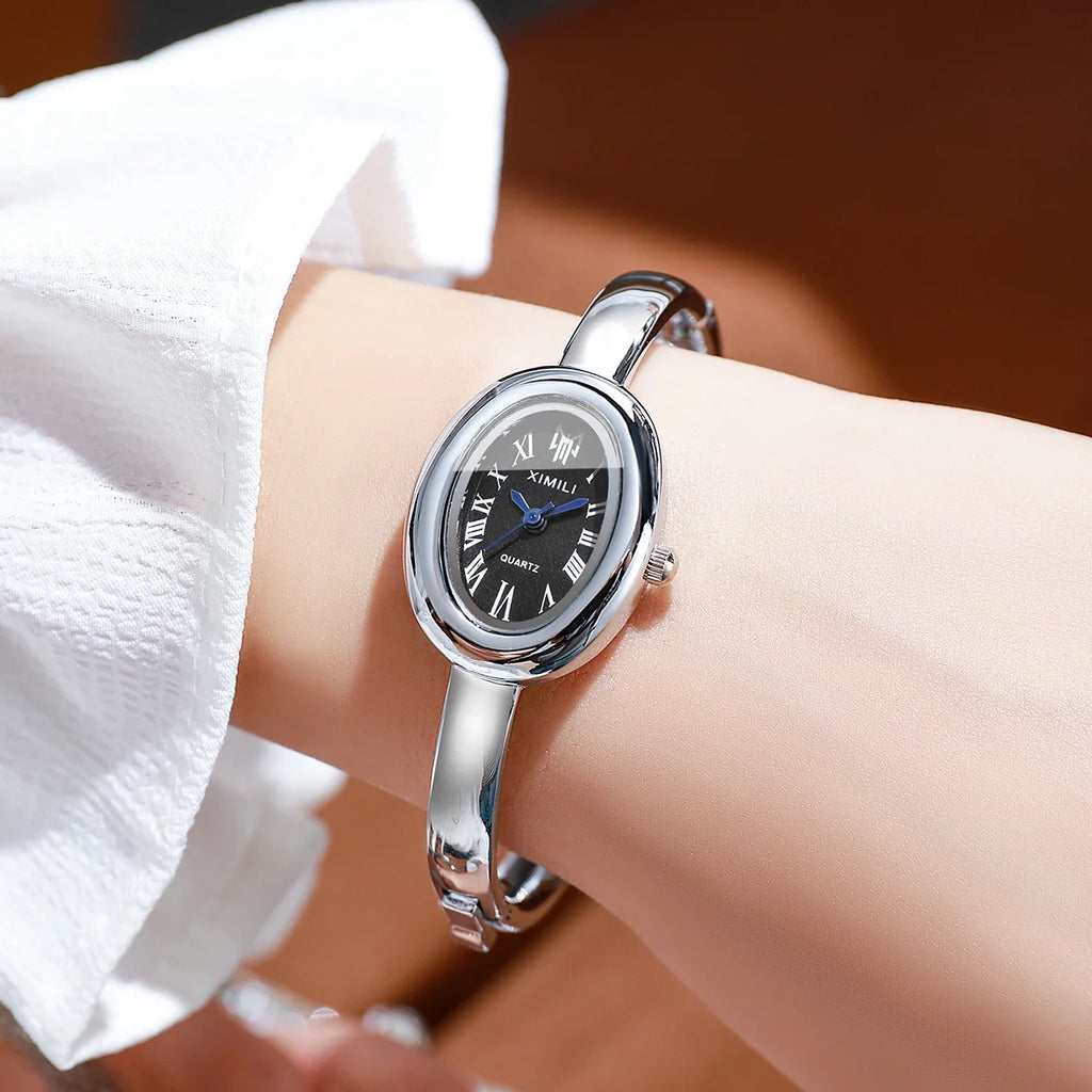 Minimalist Gold Bangle Ladies Watch | Oval Dial Roman Numerals Bangle Ladies Watch Qme