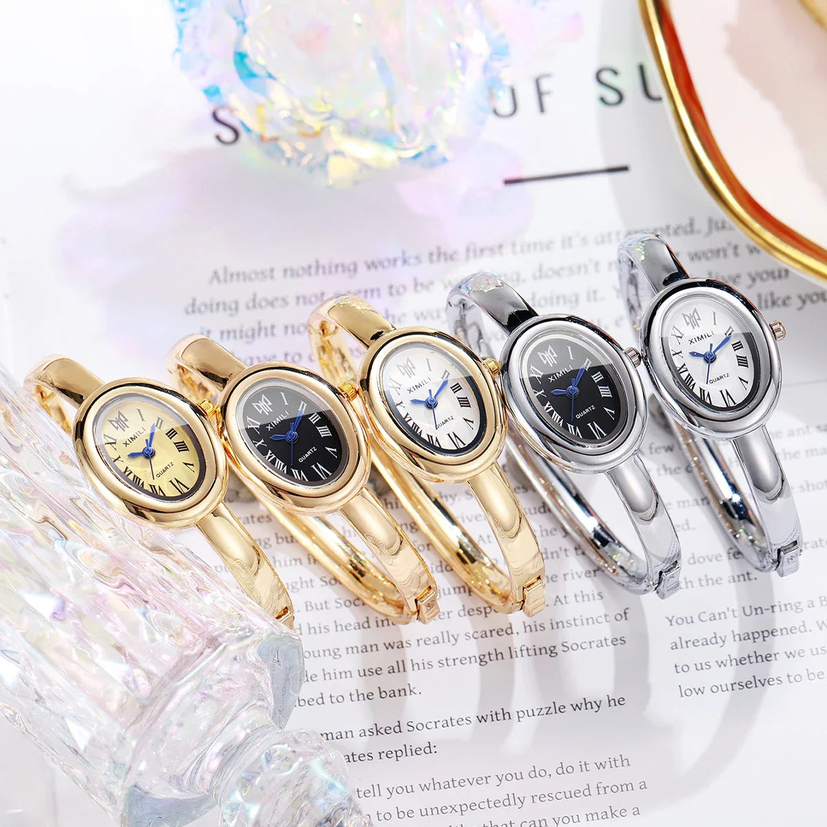 Minimalist Gold Bangle Ladies Watch | Oval Dial Roman Numerals Bangle Ladies Watch Qme