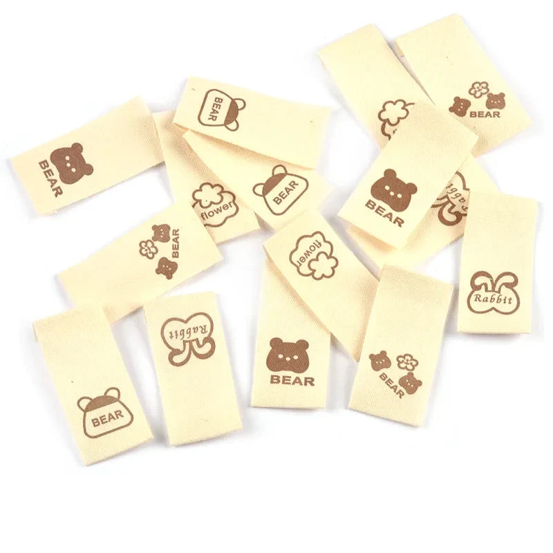 20x40mm Bear Rabbit Printed Beige Cloth Labels 50pcs – DIY Craft Fabric Craft Labels Qme random mix